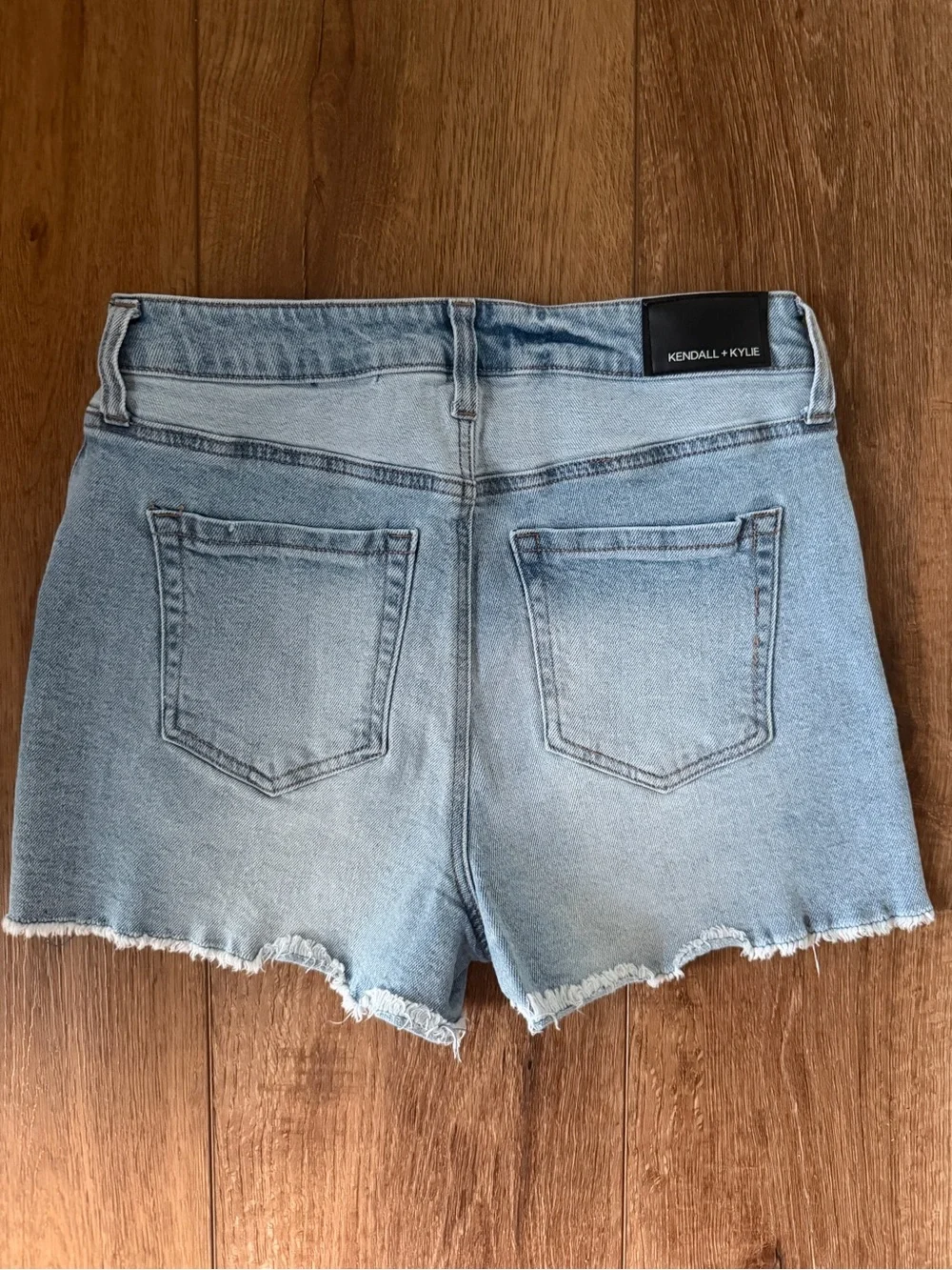 light wash distressed denim shorts
